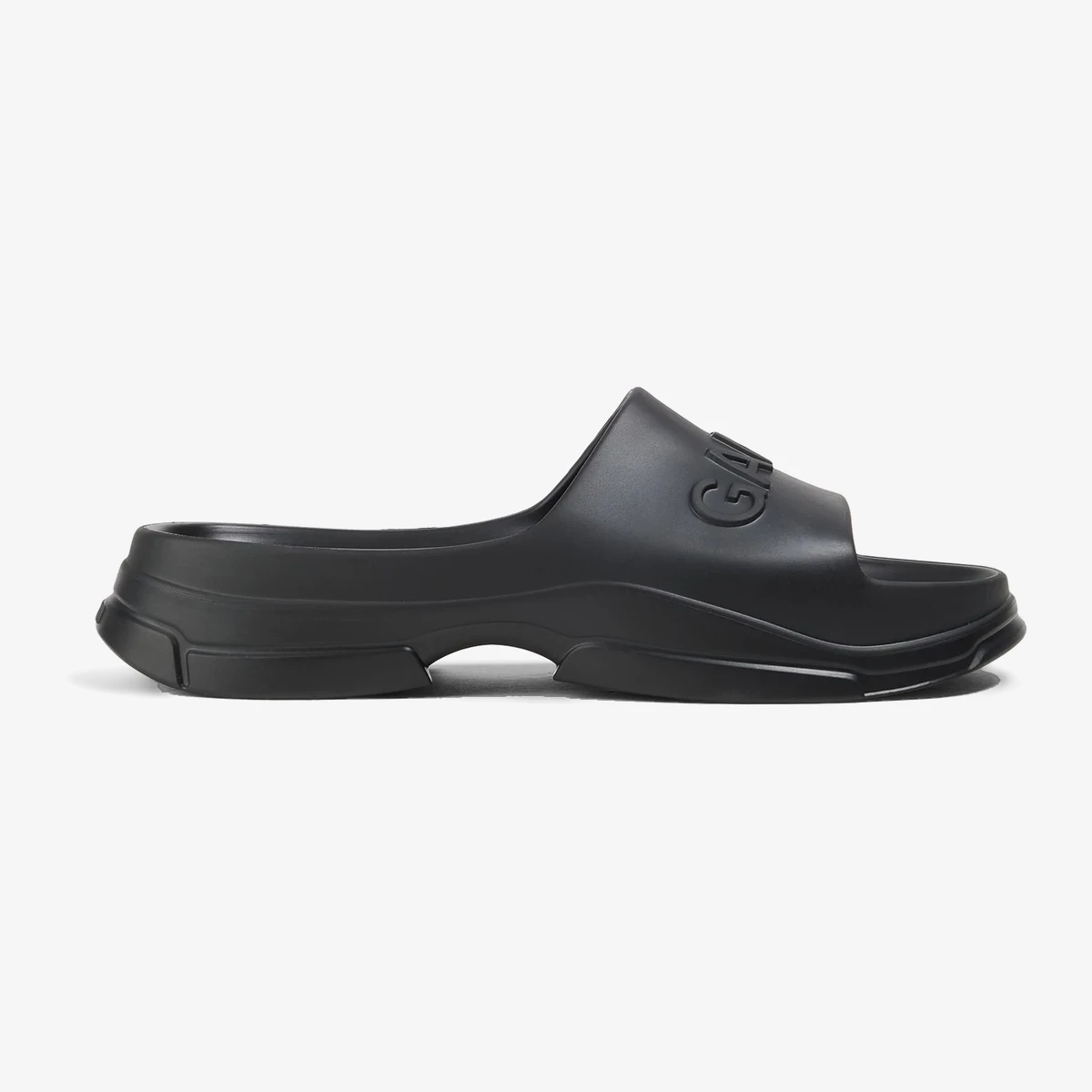 GANNI Embossed rubber slides in Black